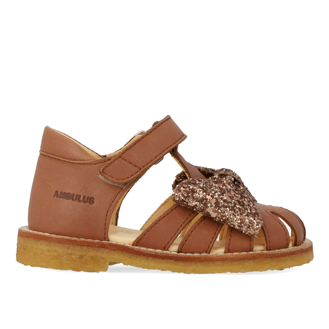 Begynder sandal med glittersløjfe og velcrolukning