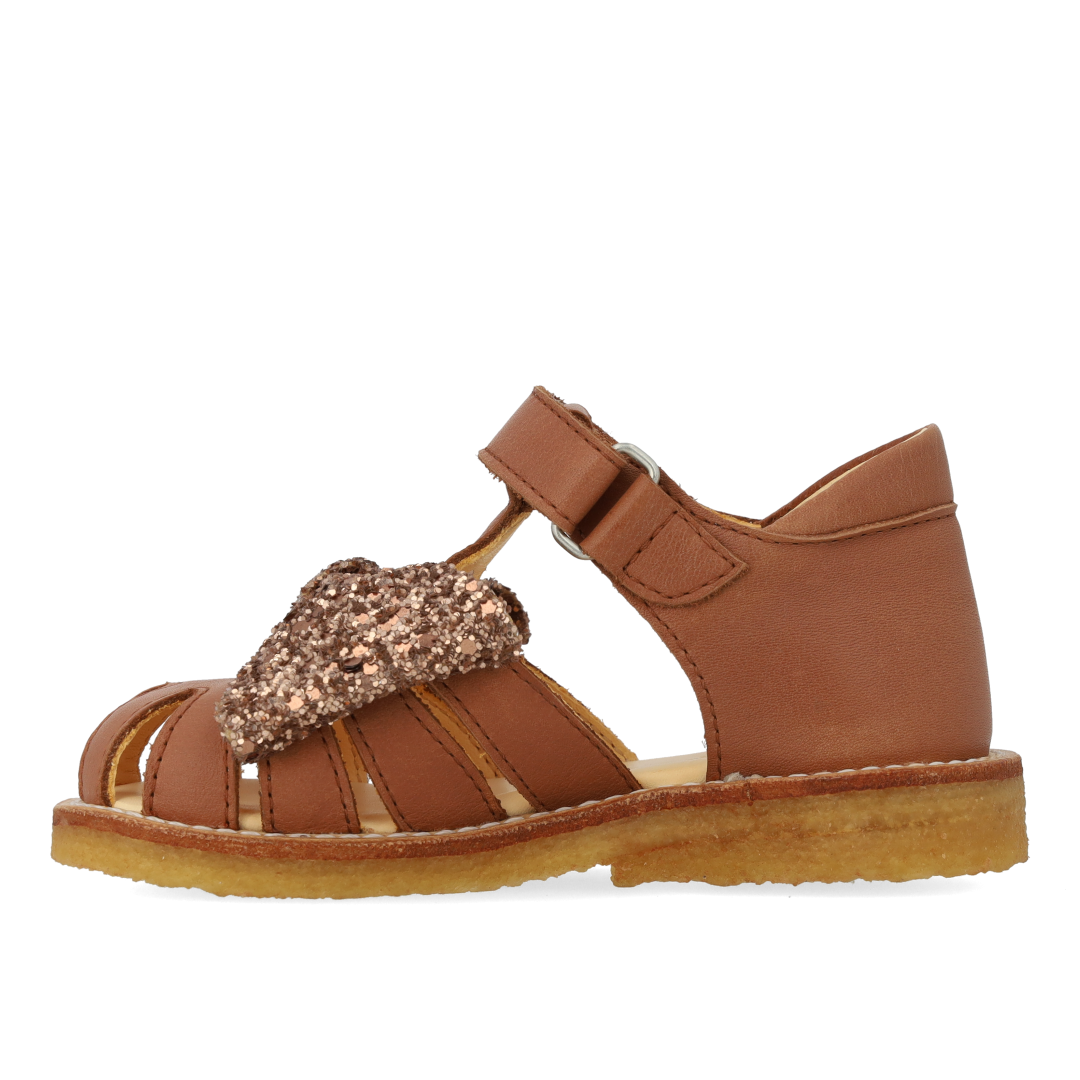 Begynder sandal med glittersløjfe og velcrolukning