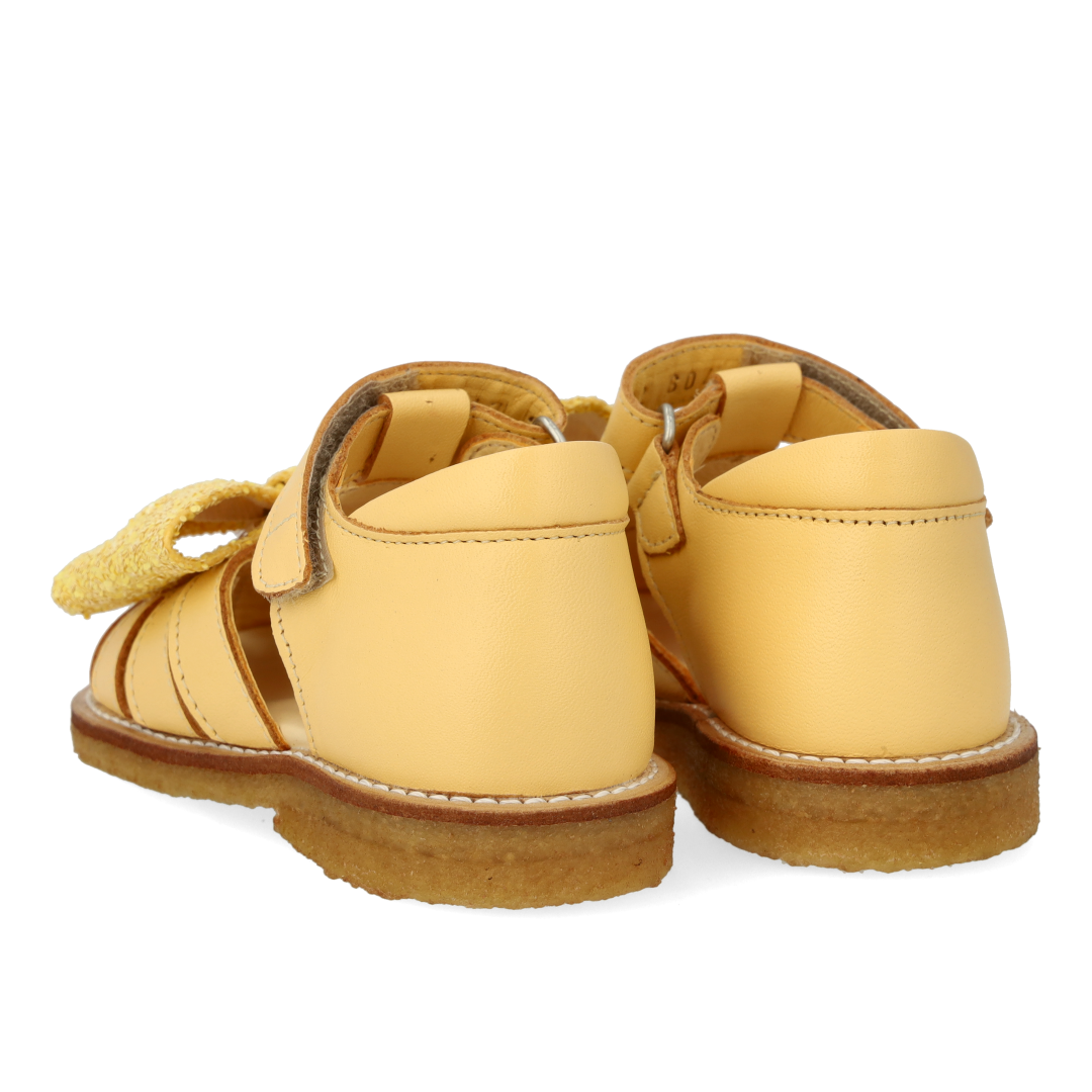 Begynder sandal med glittersløjfe og velcrolukning
