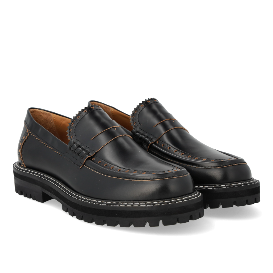 Loafer med dekorativt brogue hulmønster