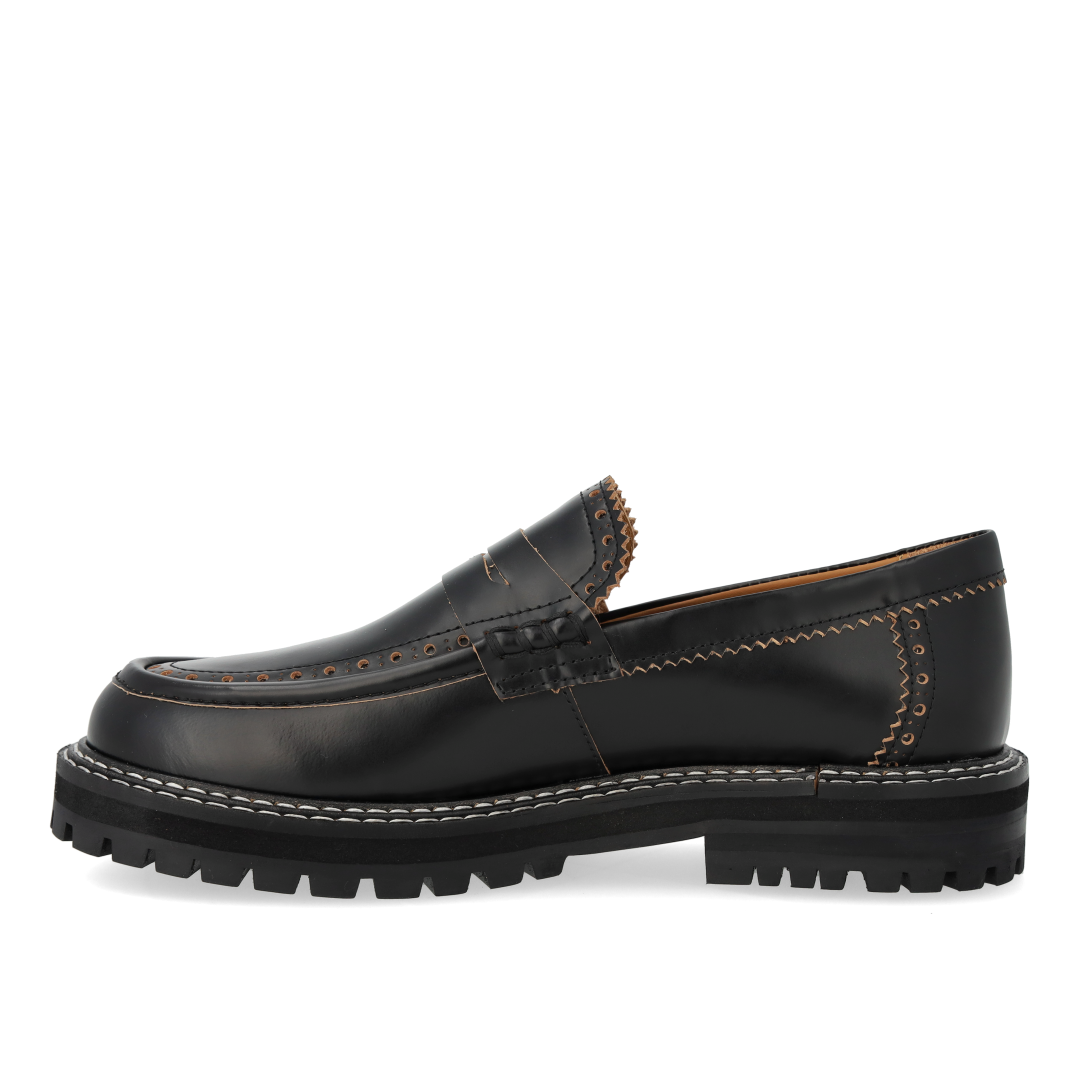 Loafer med dekorativt brogue hulmønster