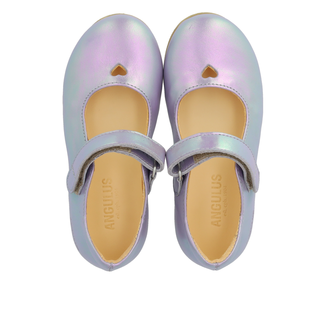 Ballerina med udstandset hjertemotiv
