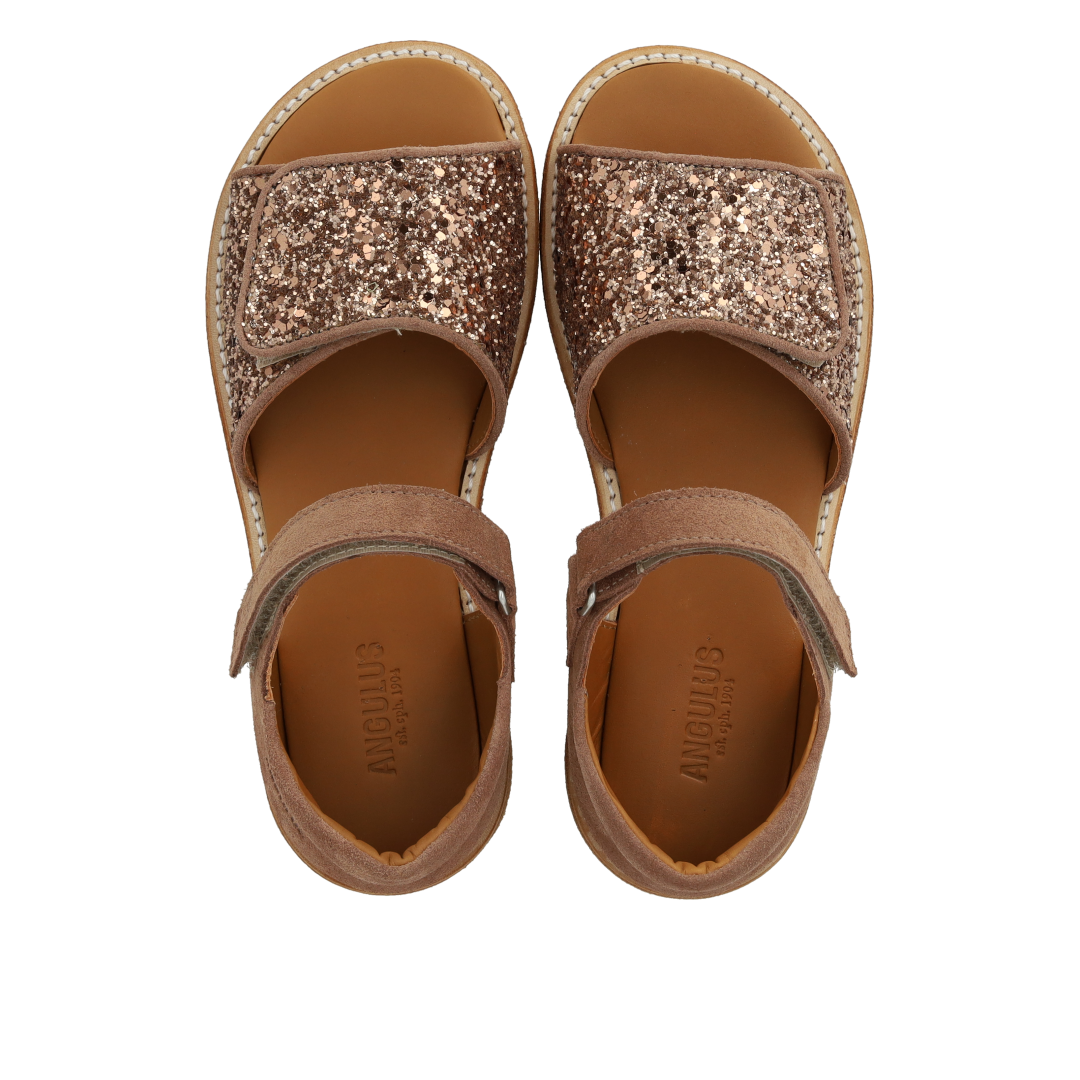 Justerbar sandal i læder med funklende glitter