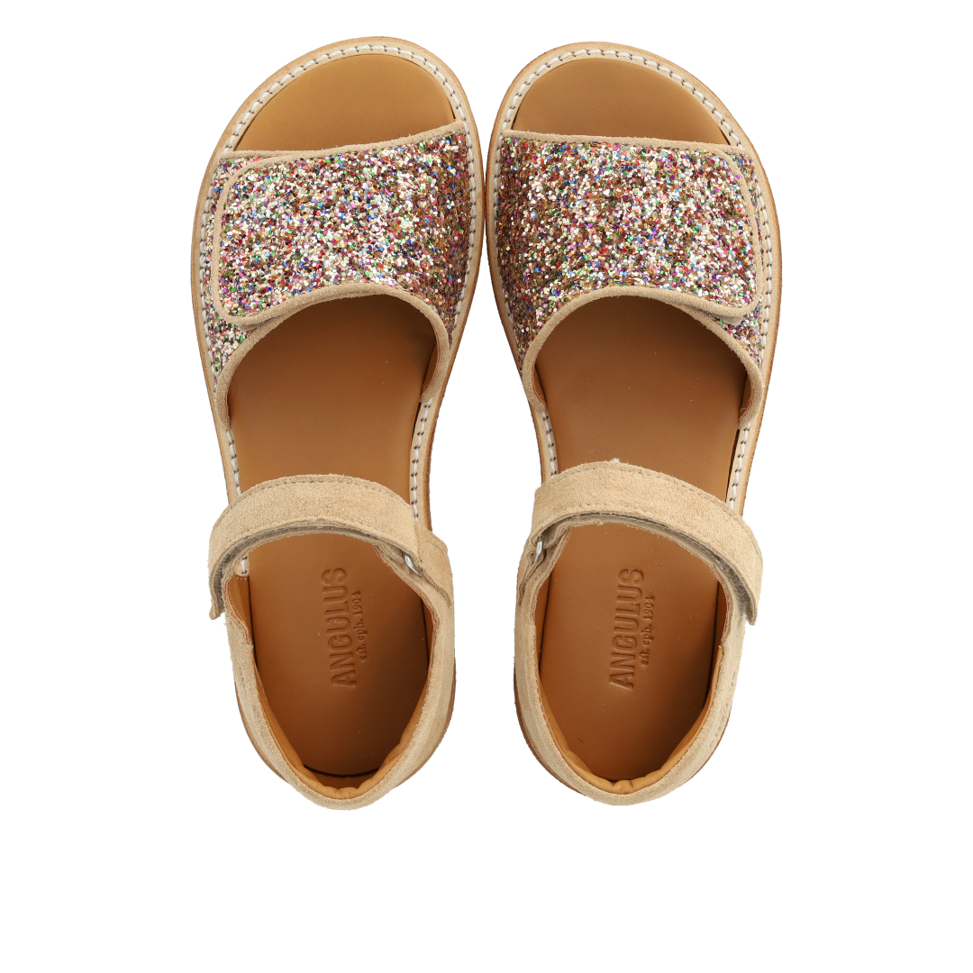 Justerbar sandal i læder med funklende glitter