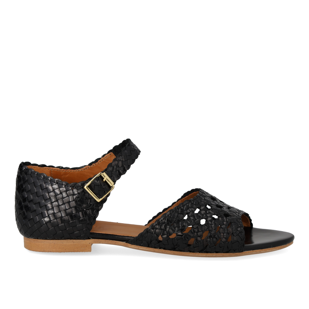 Håndflettet sandal med hulmønster detalje