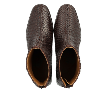 Håndflettet læderstøvlet med skulpturel blokhæl